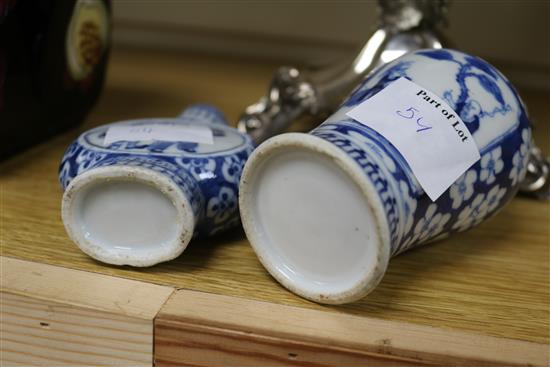 Two famille verte vases, two blue and white Chinese vases, a dish and a carved stand